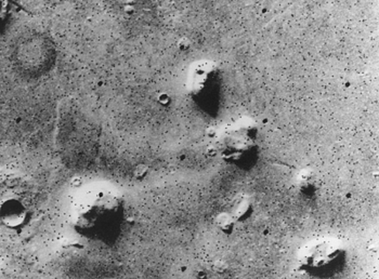MARTIAN FACE: The notorious 'Face on Mars' located in the planet’s Cydonia Region (NASA / JPL)