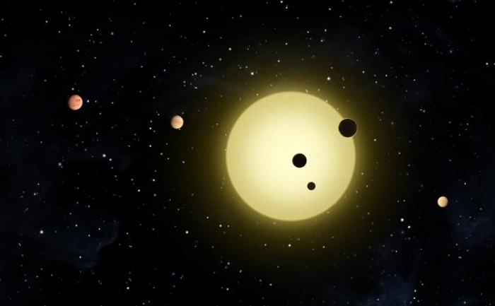 Cele sase planete care orbiteaza in jurul stelei lor Kepler-11, aflata la 2,000 de ani lumina de Pamant