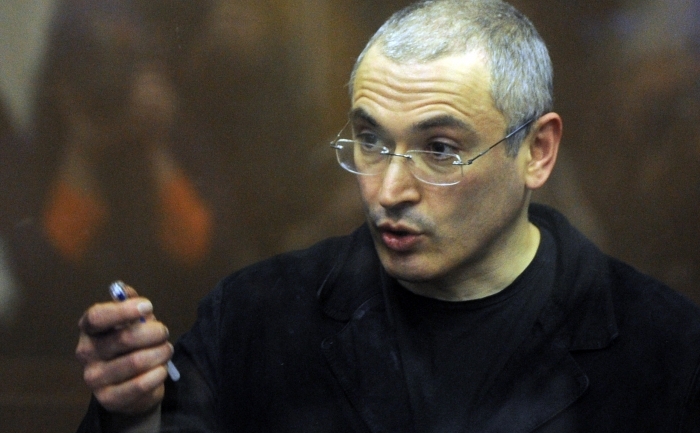 Fostul boss al companiei Iukos, Mihail Hodorkovski, vorbind in boxa acuzatilor, imediat dupa verdictul primit pe 30 decembrie 2010, in cel de-al doilea proces politic al sau (DMITRY KOSTYUKOV / AFP / Getty Images)