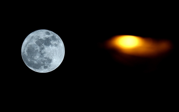 Fenomenul de Super Luna, 19 martie 2011. Lumina galbena din dreapta provine de la un stalp de lumina