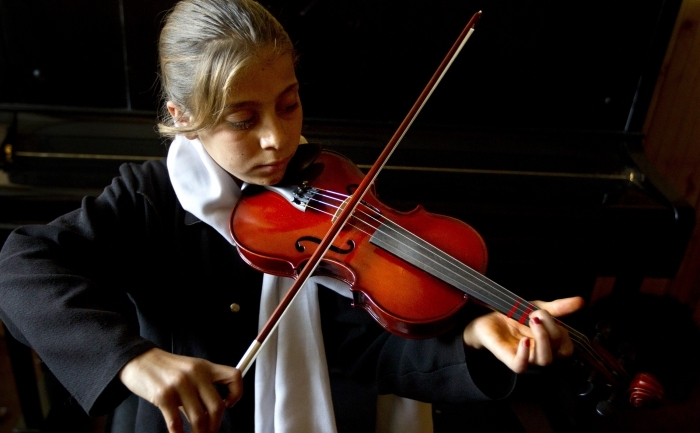 Marjan Fidaye, violonista la 11 ani. (Paula Bronstein  / Getty Images)