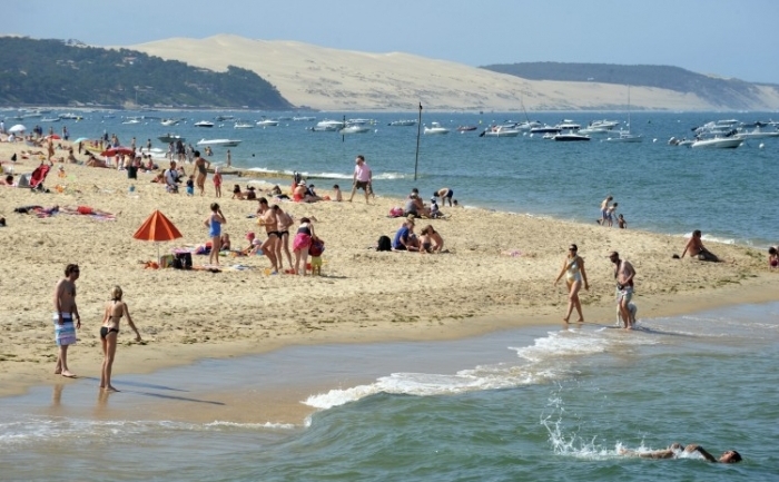Cei care merg la plaja au sanse sa faca mai putine melanoame crescand timpul de expunere la soare (Nicolas Tucat / AFP / Getty Images)