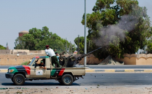 Arhivă. Rebeli libieni angajati in lupte cu trupele loialiste, Tripoli (Daniel Berehulak/Getty Images)