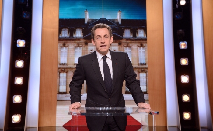 Preşedintele în exerciţiu şi candidat al UMP la alegerile prezidenţiale din 2012, Nicolas Sarkozy, participă la emisiunea televizată „Paroles de candidats” a postului francez TF1, 12 martie 2012 (ERIC FEFERBERG / AFP / Getty Images)