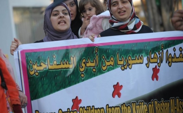 Femei siriene strigând slogane împotriva guvernului, Islamabad, 2 martie 2012