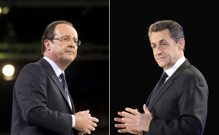 Ex-preşedintele francez de dreapta Nicolas Sarkozy şi preşedintele actual Francois  Hollande.