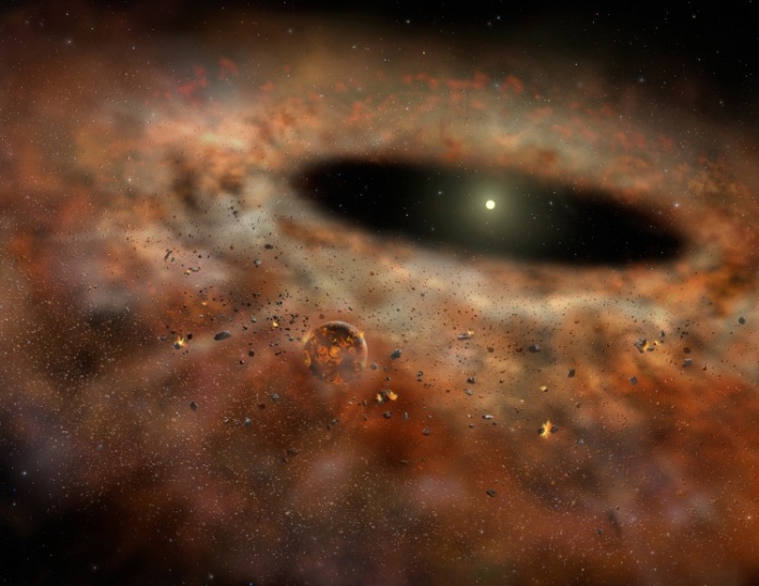 Imagine artistică despre sistemul cosmic TYC 8241 2652, aşa cum se crede că ar fi apărut el cu aniîn urmă, pe când emitea uriaşe cantităţi de radiaţii infraroşii