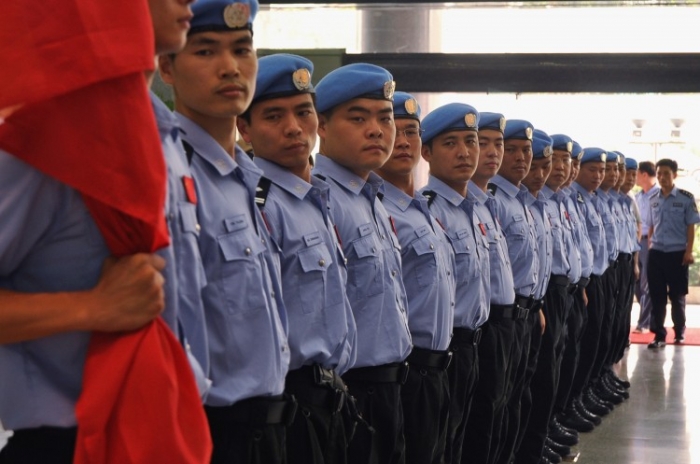 Poliţişti chinezi la o ceremonie a Departamentului Securităţii Publice Hunan, 2011.