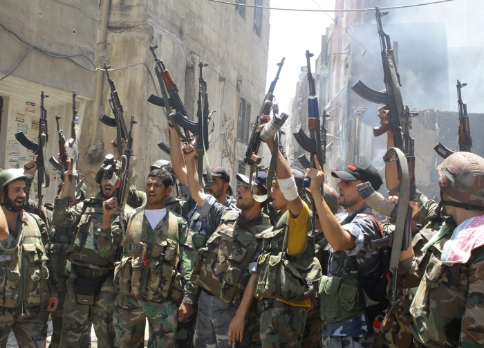 Soldaţi sirieni în Damasc (LOUAI BESHARA / AFP / GettyImages)