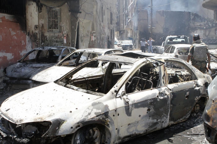 Case şi maşini distruse de luptele din Damasc
