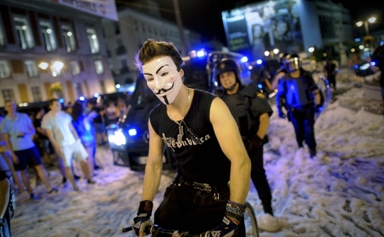 Spaniol mascat protestând împotriva austerităţii impuse de guvernul spaniol, 19 iulie 2012 în Madrid (PEDRO ARMESTRE / AFP / GettyImages)