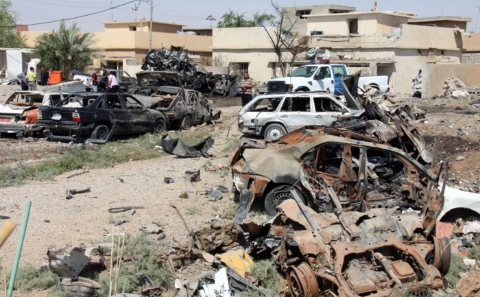 Vehicule distruse de una dintre cele mai sângeroase zile din ultima perioadă, Kirkuk, 16 august 2012 (MARWAN IBRAHIM / AFP / GettyImages)