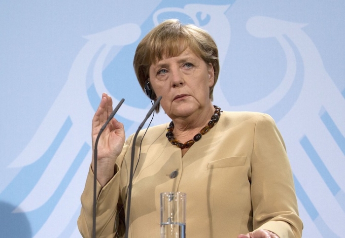 Cancelarul german Angela Merkel, la conferinţă de presă, 24 august, Berlin (David Gannon / AFP / GettyImages)