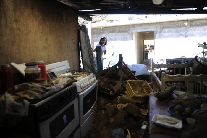 O casă distrusă de cutremur, San Marcos, 200 km de Guatemala City, 8 noiembrie 2012