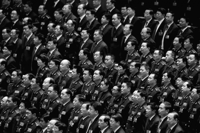 Delegaţi participând la sesiunea de deschidere a celui de-al 18-lea Congres al Partidului Comunist, care a avut loc în Marea Sală a Poporului, pe 8 noiembrie, în Beijing. Congresul ţine de pe 8 până pe 14 noiembrie şi va stabili noii lideri de Partid. (Feng Li / Getty Images)