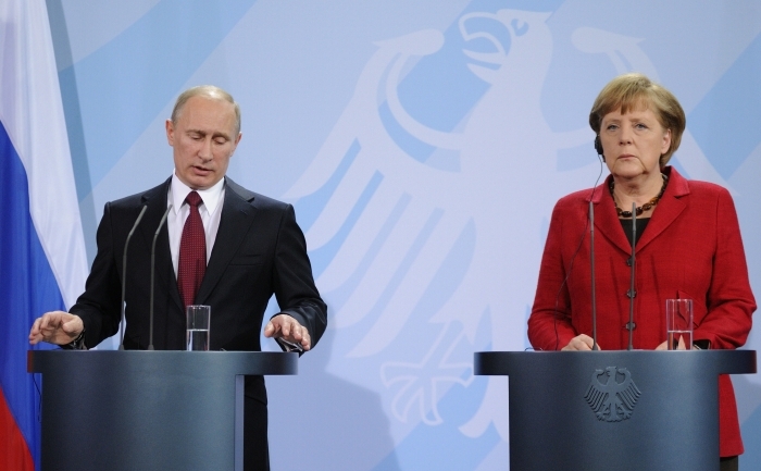 Cancelarul federal, Angela Merkel şi preşedintele rus, Vladimir Putin. (DAGMAR KIELHORN / AFP / GettyImages)