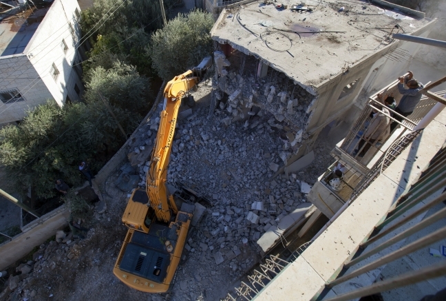 Israel autorizează construirea a 3.000 de locuinţe în coloniile din Ierusalimul de Est şi Cisiordania (AHMAD GHARABLI / AFP / Getty Images)