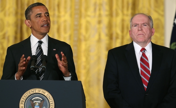 Preşedintele Barack Obama şi  consilierul său John Brennan. (Mark Wilson / Getty Images)