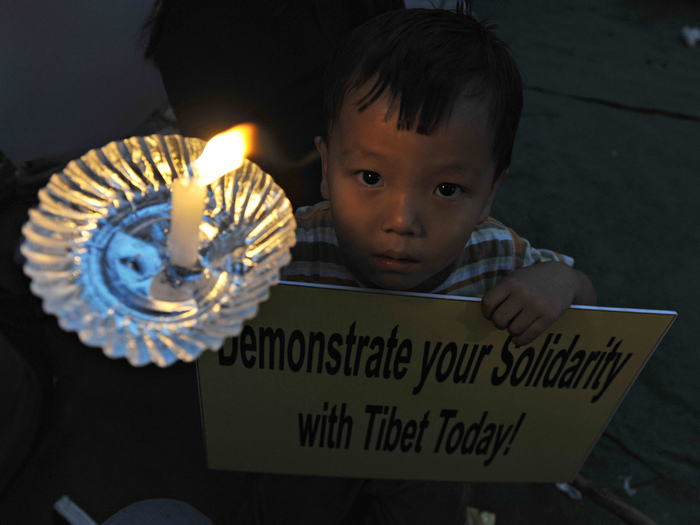 Tibetani în exil în timpul unui protest în Hiderabad, India, 10 ianuarie 2013