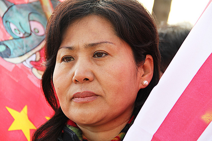 
Geng He, soţia avocatului chinez dispărut Gao Zhisheng, la un miting în Washington, DC, 14 februarie 2012
