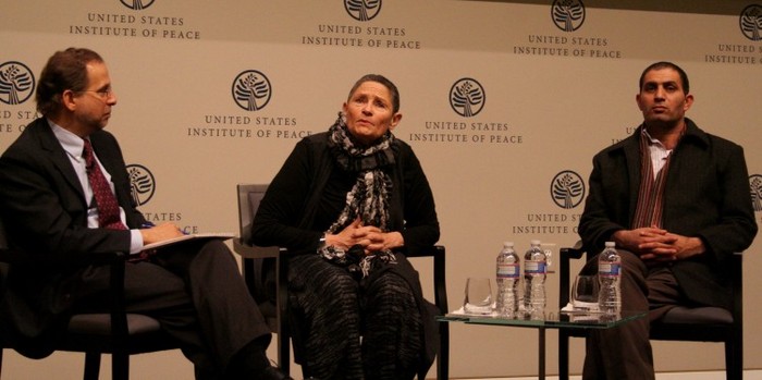 Aramin (R) following the screening of a new documentary on the Arab-Israeli conflict titled, “Two Sided Story,” at the United States Institute of Peace (USIP) in Washington, D.C., on Feb. 7, 2013.