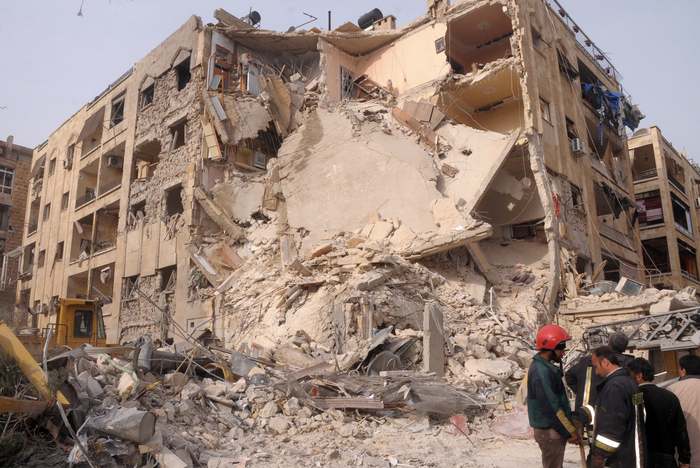 O clădire a fost grav avariată de un atentat cu bomba. (- / AFP / Getty Images)