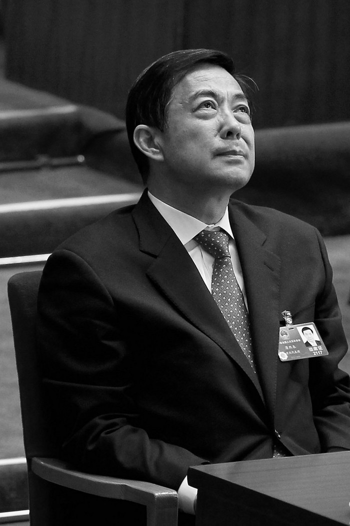 Fostul membru al Biroului Politic căzut în dizgraţie, Bo Xilai, participă la sesiunea de închidere a Congresului Naţional al Poporului, la 14 martie 2012, în Beijing, China. În ziua următoare, Bo urma să fie demis din posturile sale din cadrul Partidului.