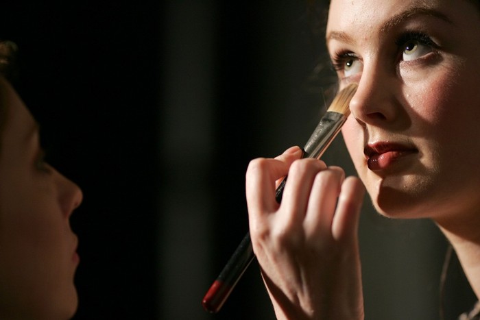 A model has make-up applied to her during an Australian Fashion Week in this file photo.