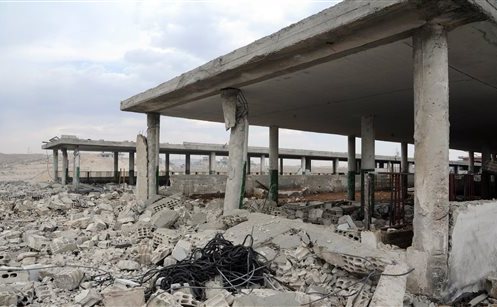 Fotografie publicată de agenţia de ştiri SANA, arătând rezultatul bombardamentelor israeliene în Damasc, Siria (AP Photo/SANA)