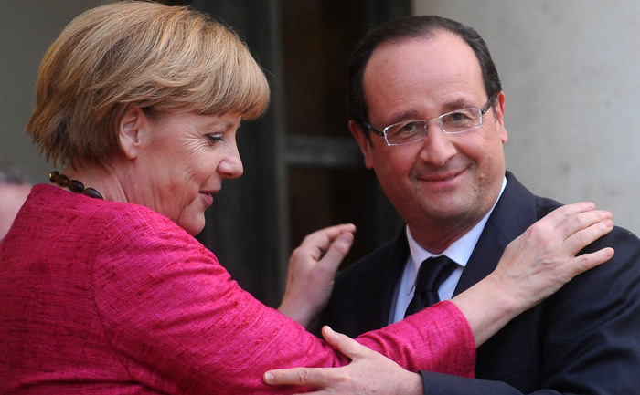 Cancelarul federal german Angela Merkel alături de preşedintele francez Francois Hollande. (Antoine Antoniol / Getty Images)