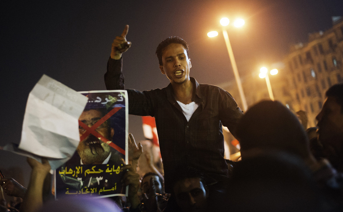 Egipt: "Morsi fii atent, vin rebelii" este sloganul deja scris pe zidurile din Cairo. (GIANLUIGI GUERCIA / AFP / Getty Images)