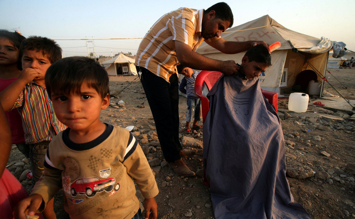 Siria: Un milion de copii şi minori obligaţi să fugă din ţara lor. (SAFIN HAMED / AFP / Getty Images)