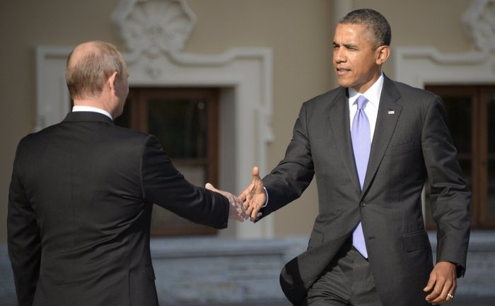 Preşedintele rus Vladimir Putin şi omologul său american Barack Obama (ALEXANDER NEMENOV / AFP / Getty Images)