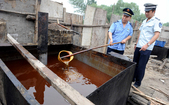 Uleiul de lături, sau de canal al Chinei, Beijing. Arhivă. 2 august 2010 (STR / AFP / GettyImages)