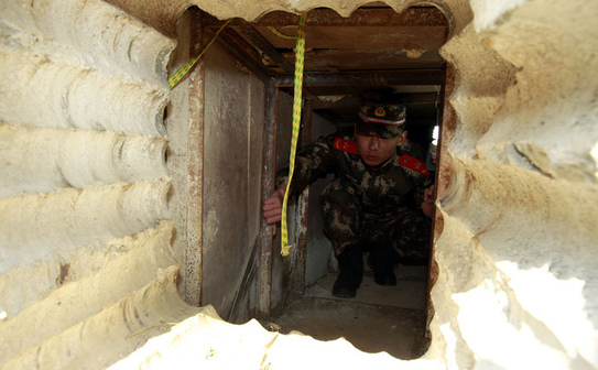 China: a fost descoperit un tunel de contrabandă între Guangdong şi Hong Kong, 24 decembrie, 2013. (STR / AFP / Getty Images)