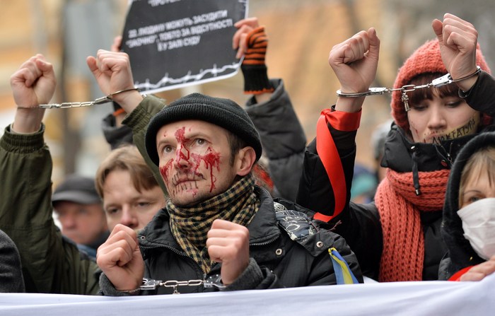 Demonstraţii la Kiev împotriva legii promulgate de Ianukovici, care limitează drepturile civile, 17 ianuarie 2014 (SERGEI SUPINSKY / AFP / Getty Images)