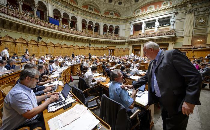 Guvernul elveţian pregăteşte noua lege privind imigraţia. (FABRICE COFFRINI / AFP / Getty Images)
