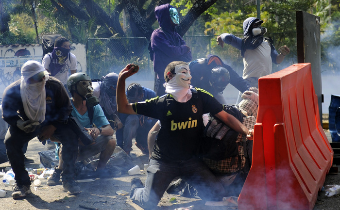 Noi revolte în Venezuela, 12 martie 2014 (LEO RAMIREZ/AFP/Getty Images)
