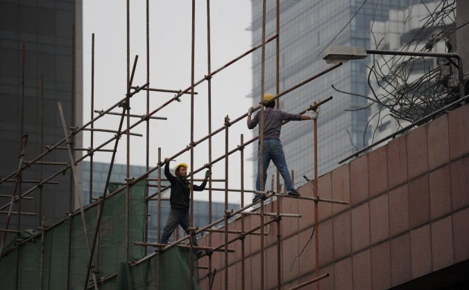 Muncitori chinezi în Beijing la 15 aprilie, 2014