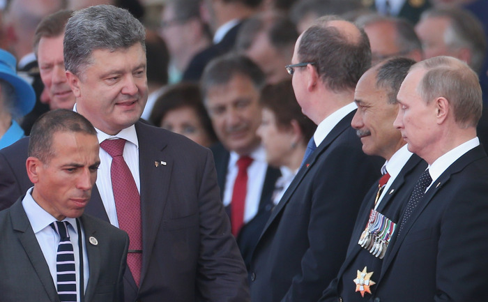 Petro Poroshenko, Guvernatorul General al Noii Zeelande Jerry Mateparae şi Vladimir Putin la cea de-a 70-a comemorare a Zilei Invaziei, 6 iunie 2014 în Ouistreham, Franţa