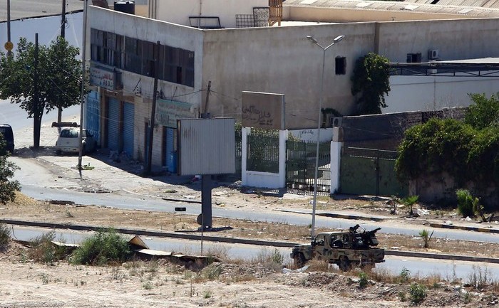 Rebeli cu mitraliere montate pe camionete, prin Tripoli, 20 iulie 2014
