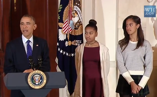 Barack, Sasha şi Malia Obama.