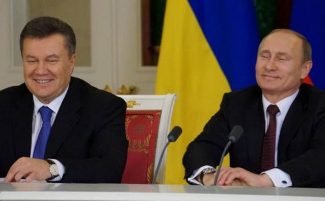 Fostul lider ucrainean Viktor Ianukovici (st) şi preşedintele rus Vladimir Putin. (Captură Foto)