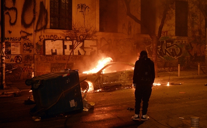 Anarhiştii la o demonstraţie în Atena, 26 februarie (LOUISA GOULIAMAKI/AFP/Getty Images)