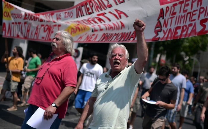 Grecii se revoltă împotriva austerităţii impuse de Troikă, 15 iulie 2015 în Atena (LOUISA GOULIAMAKI/AFP/Getty Images)
