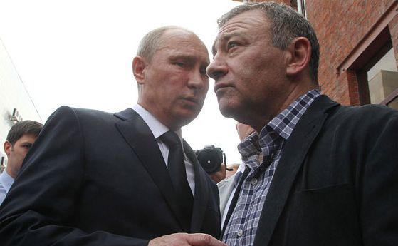 Preşedintele rus Vladimir Putin (st) şi omul de afaceri Arkadi Rotenberg.