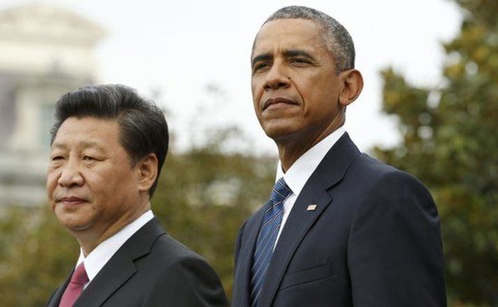 Preşedintele chinez Xi Jinping (st) şi omologul său american Barack Obama.