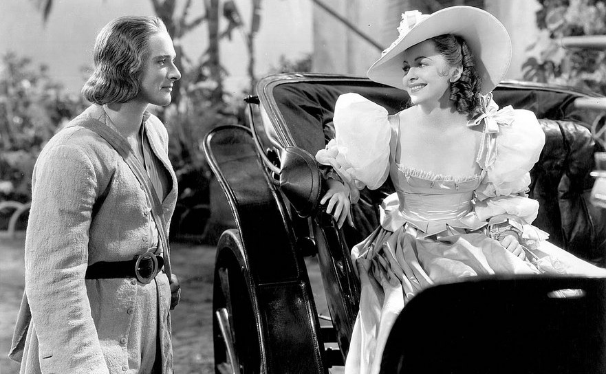 Olivia de Havilland şi Errol Flynn în filmul Captain Blood, 1935 (emerdelac.wordpress.com)