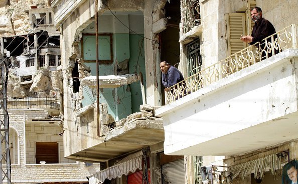 Este legitimă vizita la rudele şi prietenii din ţara de origine pentru acele persoane care au fugit de acolo pentru a solicita azil în Germania? Imagine simbol: vechiul oraş creştin Maalula, situat la cca. 60 km nord-est de capitala siriană Damasc. (Foto: LOUAI BESHARA/AFP/Getty Images – Epoch Times Germania)