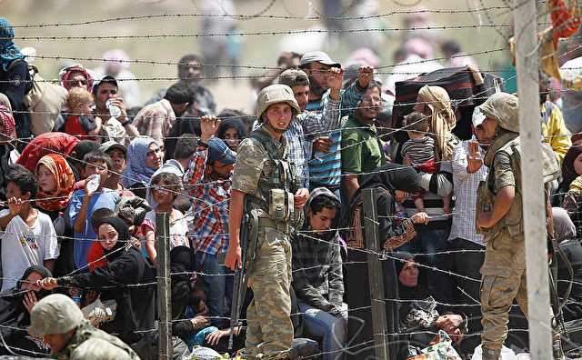 Refugiaţi la graniţa turco - siriană
 